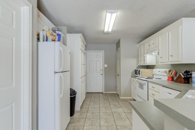 kitchen featuring white cabinetry, white appliances, light tile patterned flooring, and a textured ceiling