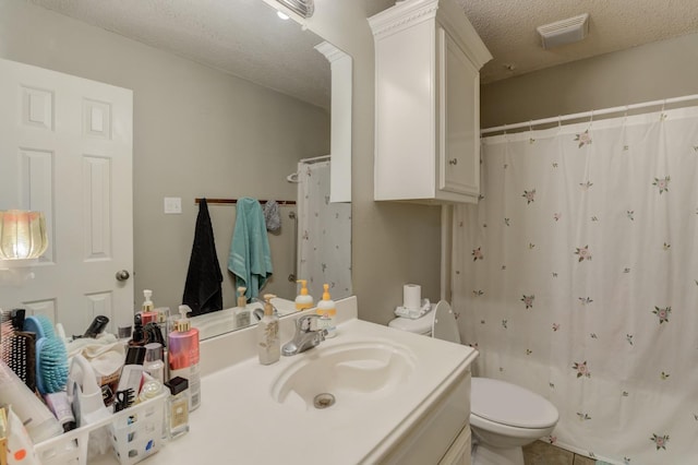 full bathroom featuring vanity, shower / bathtub combination with curtain, a textured ceiling, and toilet