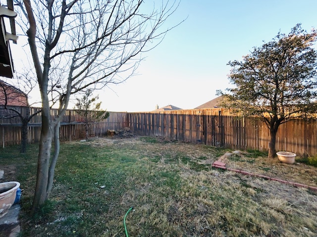 view of yard featuring a fenced backyard