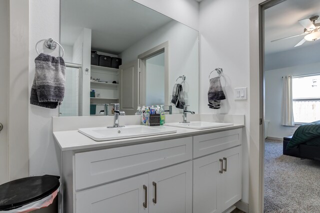 6904 56th St, Lubbock, TX 79407 - ensuite bathroom featuring double vanity and a ceiling fan