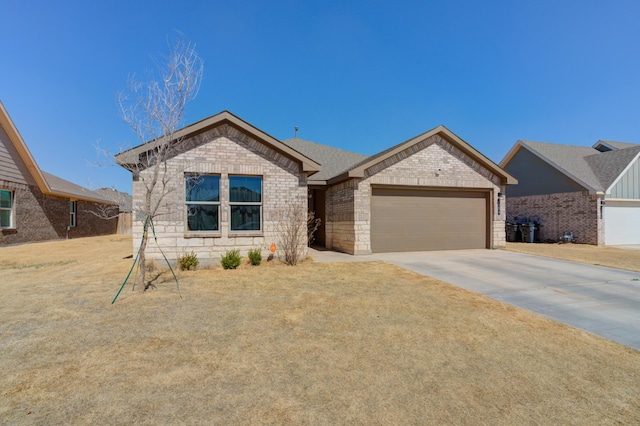 6904 56th St, Lubbock, TX 79407 - ranch-style house with brick siding, a garage, and driveway