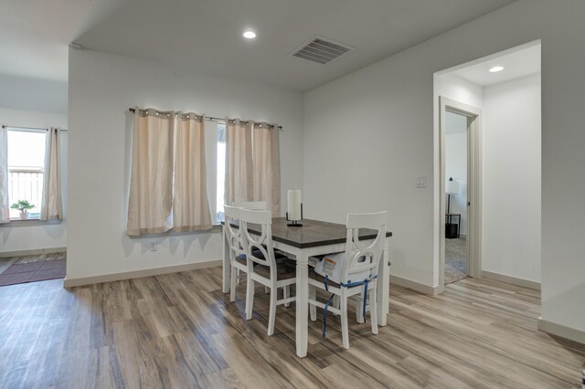 6904 56th St, Lubbock, TX 79407 - dining area featuring light wood-style floors, baseboards, and recessed lighting