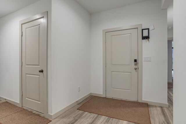 6904 56th St, Lubbock, TX 79407 - entrance foyer featuring light wood finished floors and baseboards