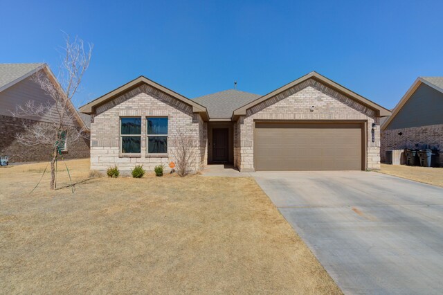 6904 56th St, Lubbock, TX 79407 - single story home featuring brick siding, an attached garage, concrete driveway, and a shingled roof