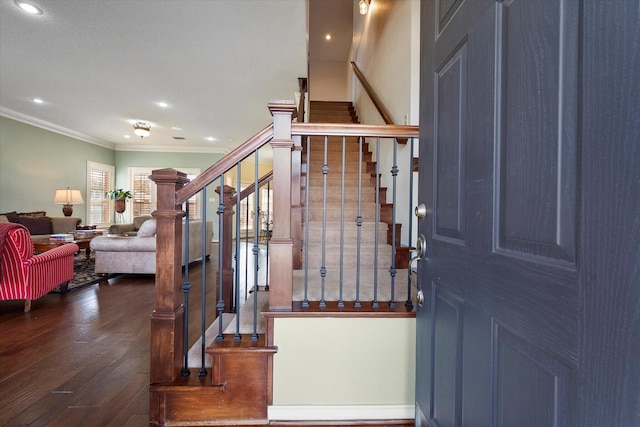 4121 86th St, Lubbock, TX 79423 - entryway with crown molding, dark wood finished floors, stairway, and recessed lighting