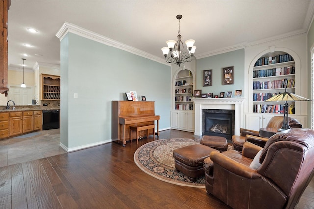 4121 86th St, Lubbock, TX 79423 - living room with crown molding and built in shelves