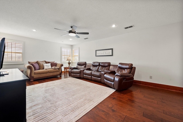 4121 86th St, Lubbock, TX 79423 - living area with dark wood finished floors, visible vents, a ceiling fan, and recessed lighting