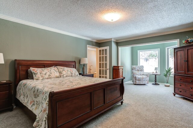 carpeted bedroom featuring crown molding and a textured ceiling