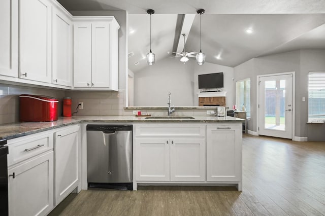 kitchen featuring hardwood / wood-style floors, dishwasher, sink, white cabinets, and hanging light fixtures