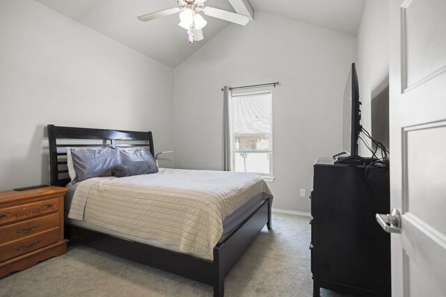 bedroom featuring lofted ceiling with beams, light carpet, and ceiling fan