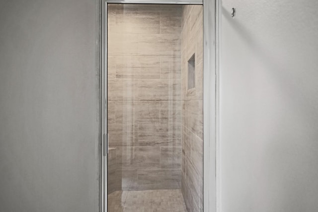 bathroom featuring walk in shower