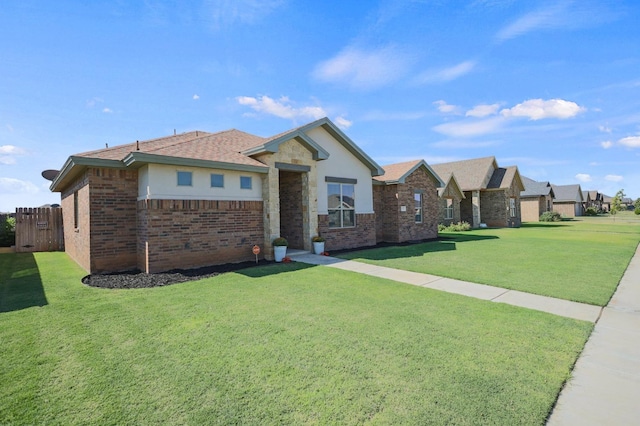 single story home with a front yard