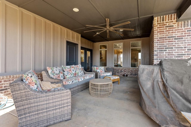 view of patio / terrace with ceiling fan and outdoor lounge area