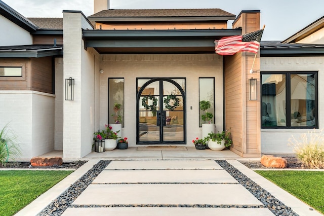 7722 47th St, Lubbock, TX 79407 - property entrance with french doors and a chimney