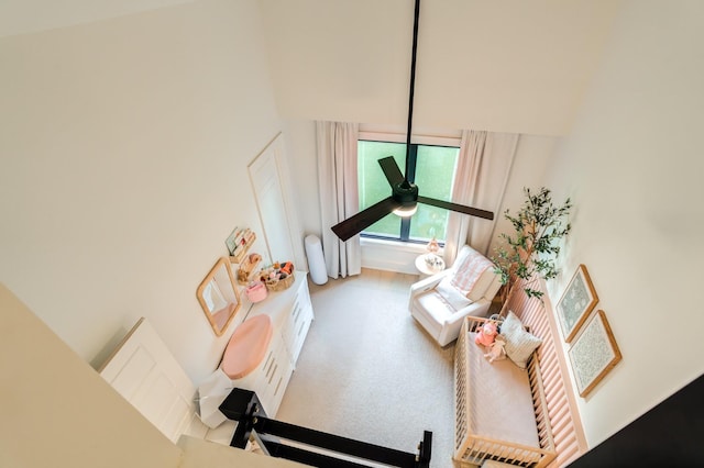 7722 47th St, Lubbock, TX 79407 - living area featuring a towering ceiling and a ceiling fan