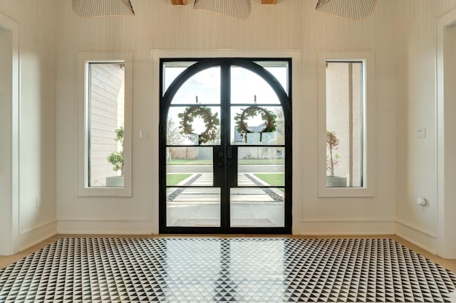 7722 47th St, Lubbock, TX 79407 - doorway featuring healthy amount of natural light and french doors
