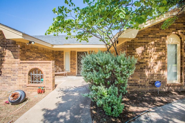 doorway to property with a patio