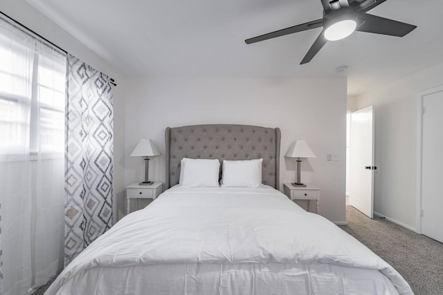 bedroom with ceiling fan and carpet