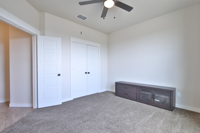 10504 Ave X, Lubbock, TX 79423 - unfurnished bedroom featuring carpet floors, a closet, and a ceiling fan