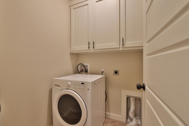 10504 Ave X, Lubbock, TX 79423 - washroom featuring washer / clothes dryer and cabinet space