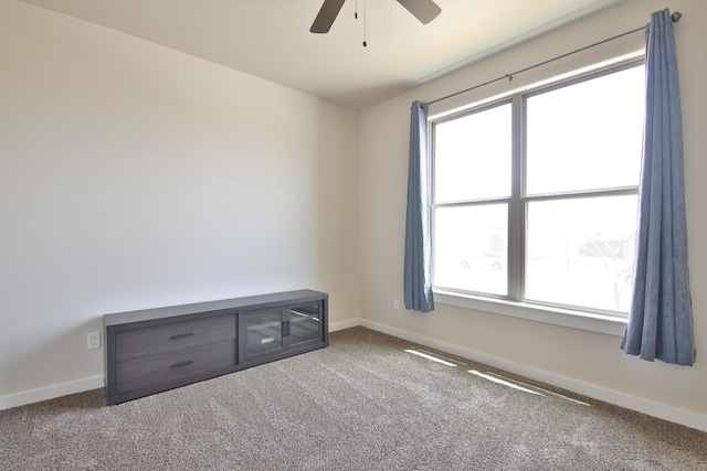 10504 Ave X, Lubbock, TX 79423 - empty room with carpet flooring and a ceiling fan