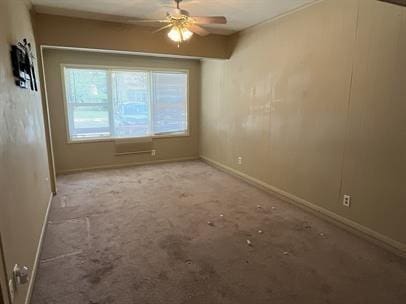 spare room featuring ceiling fan