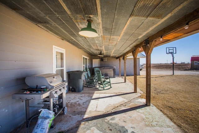 view of patio / terrace featuring a hot tub