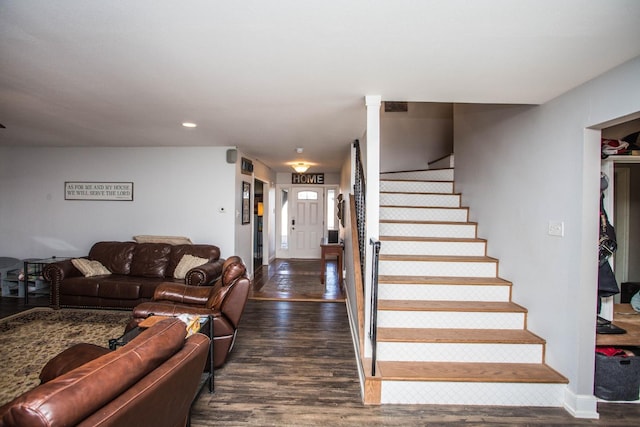 stairs featuring wood-type flooring