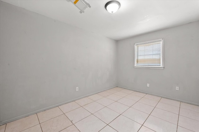 view of tiled spare room