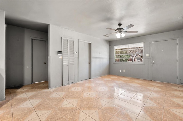 entryway with ceiling fan