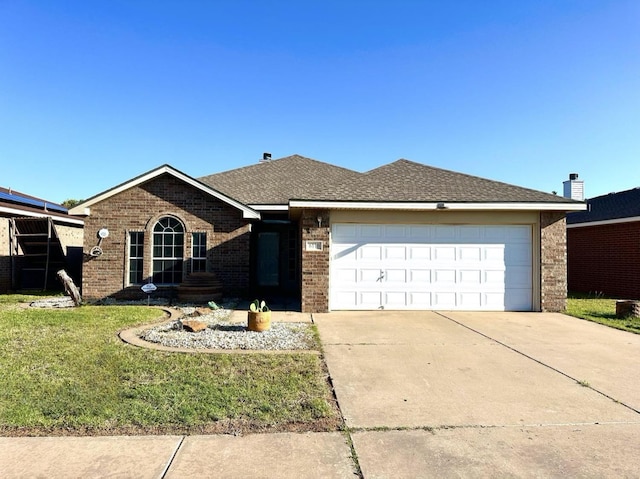 ranch-style house with a garage and a front yard