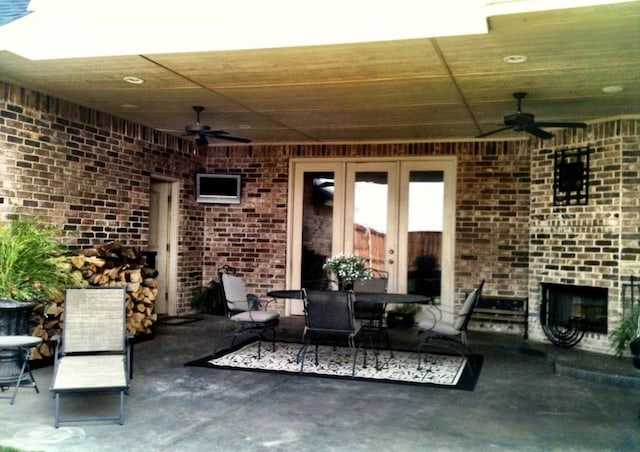 view of patio / terrace featuring ceiling fan