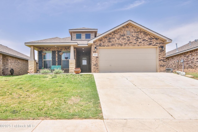 14320 Ave U, Lubbock, TX 79423 - view of front of house featuring a front lawn, a garage, concrete driveway, and brick siding