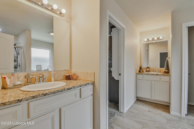 14320 Ave U, Lubbock, TX 79423 - full bathroom featuring vanity and backsplash