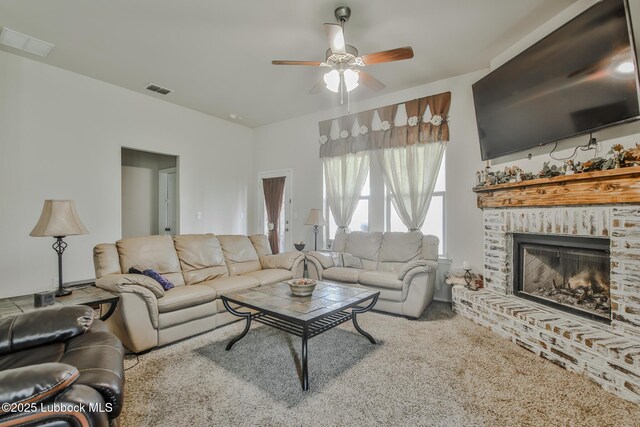 14320 Ave U, Lubbock, TX 79423 - living room featuring ceiling fan, a brick fireplace, and carpet
