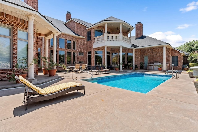 view of pool featuring a patio area