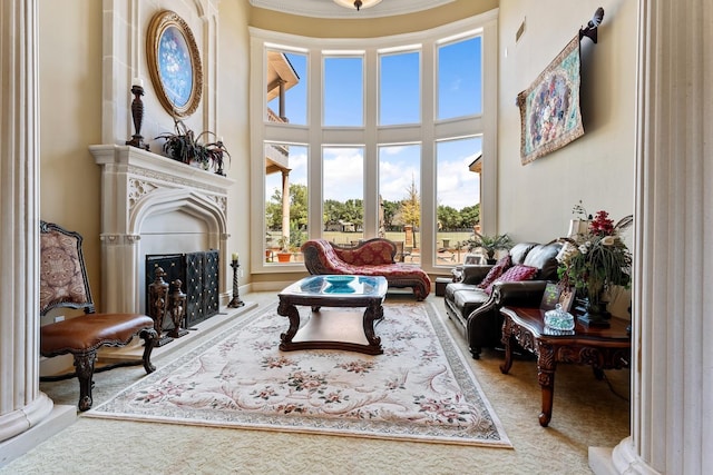 sitting room featuring a towering ceiling