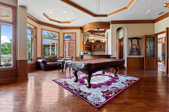 playroom with crown molding, wooden walls, a tray ceiling, dark hardwood / wood-style flooring, and pool table