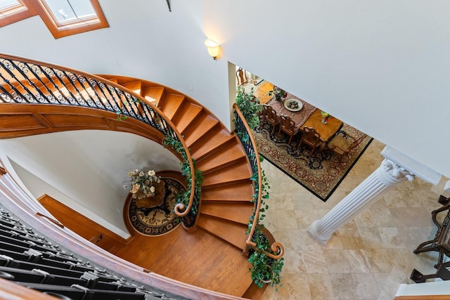 stairs with hardwood / wood-style floors