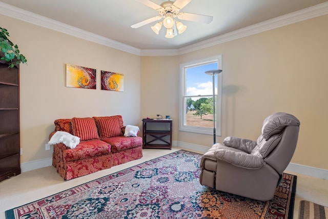 carpeted living room featuring ornamental molding and ceiling fan