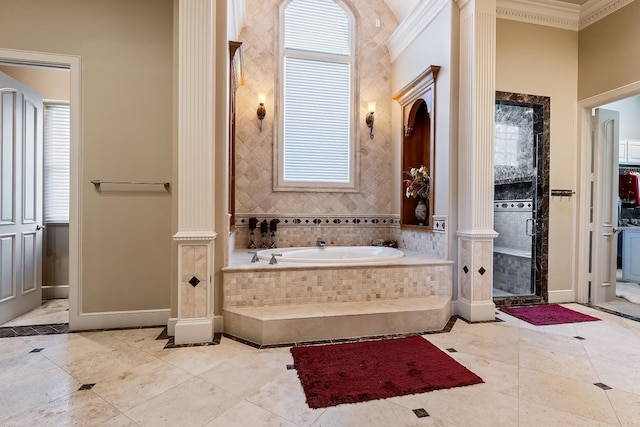 bathroom with tile patterned flooring, crown molding, decorative columns, and independent shower and bath