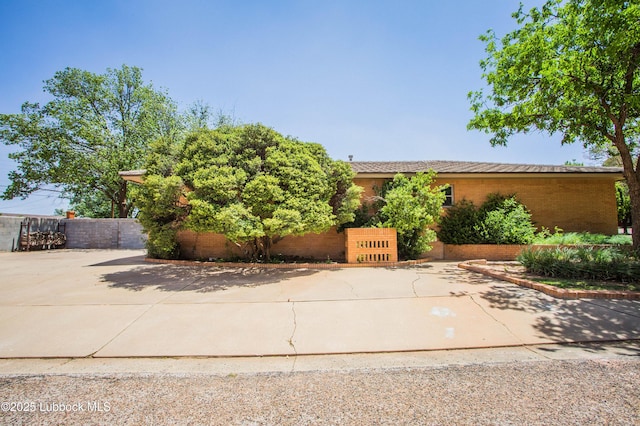 610 N 20th St, Lamesa, TX 79331 - view of front of house with brick siding
