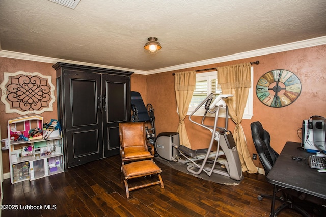 610 N 20th St, Lamesa, TX 79331 - office space featuring hardwood / wood-style flooring, ornamental molding, a textured wall, and a textured ceiling