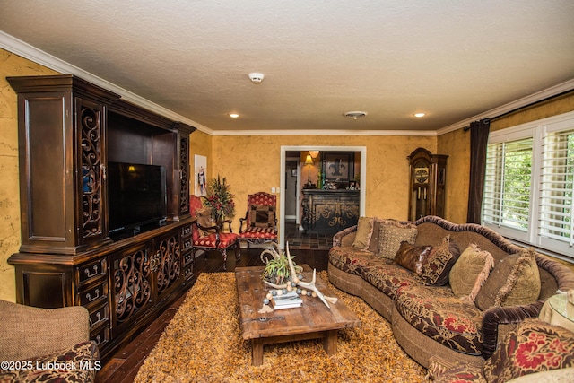610 N 20th St, Lamesa, TX 79331 - living room featuring wood-type flooring, ornamental molding, and recessed lighting