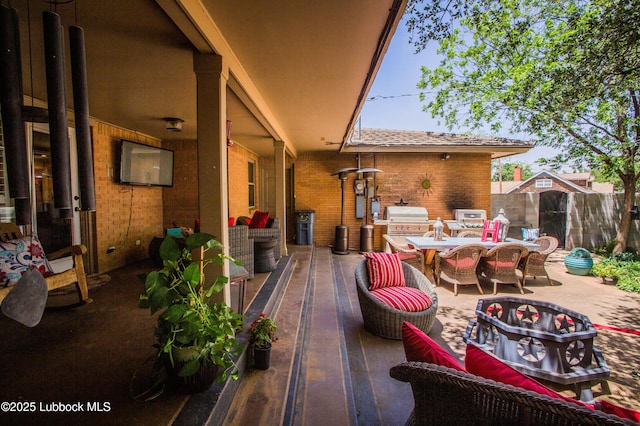 610 N 20th St, Lamesa, TX 79331 - view of patio with outdoor dining space and a grill
