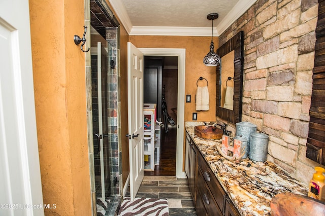 610 N 20th St, Lamesa, TX 79331 - bathroom featuring vanity and ornamental molding