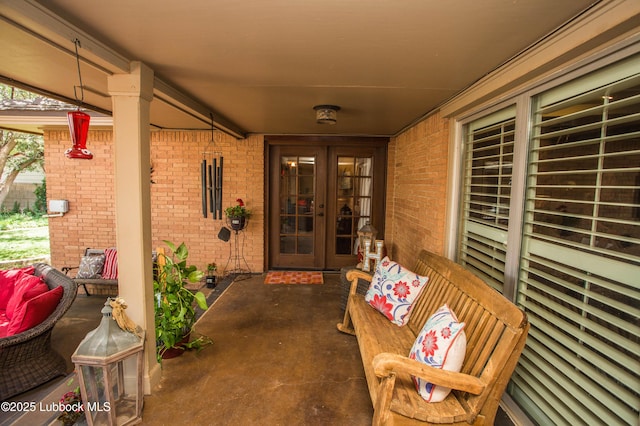 610 N 20th St, Lamesa, TX 79331 - view of exterior entry with french doors and brick siding
