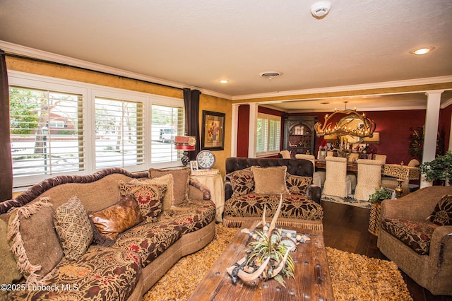 610 N 20th St, Lamesa, TX 79331 - living room with ornamental molding, wood-type flooring, a chandelier, healthy amount of natural light, and recessed lighting