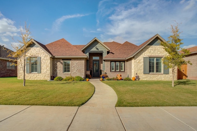 view of front of property with a front lawn