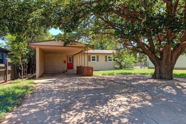 view of front of home featuring a carport